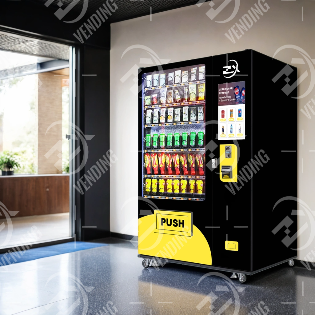 Black and yellow snack and drink vending machine beside a glass entrance